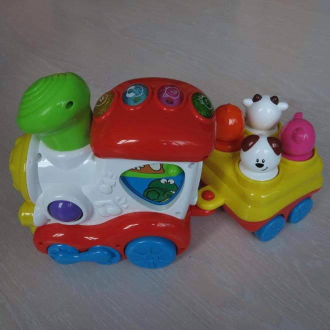 Музыкальная игрушка "Поющий поезд" Chicco